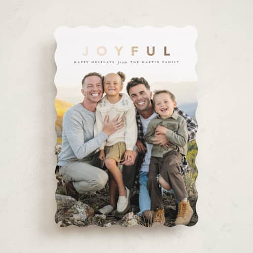 This is a coal foil pressed holiday cards with foil pressed by Laura Hamm called a joyful family printing on recycled smooth signature in standard