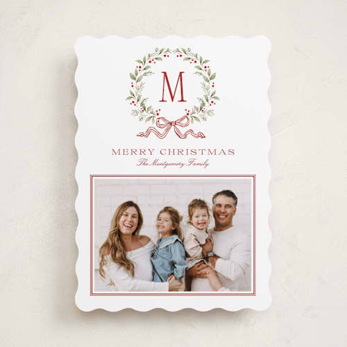 This is a cranberry holiday photo cards with standard by Wildfield Paper Co called holly berry monogram printing on recycled smooth signature in standard