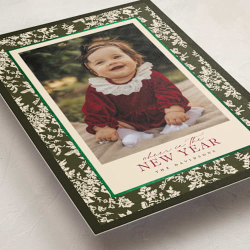 This is a pine foil stamped holiday cards with foil pressed by Jenna Holcomb called merry floral toile printing on signature in grand