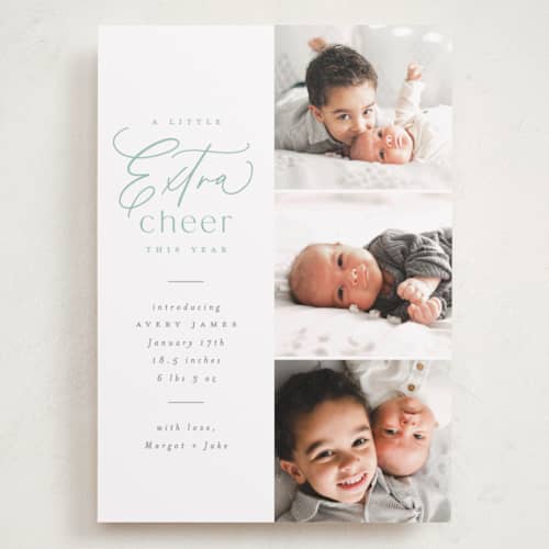 This is a mint babys first christmas with standard by Everett Paper Goods called extra cheer here printing on recycled smooth signature in grand