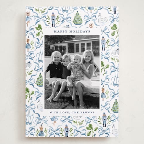 This is a blue ribbon holiday photo cards with standard by Sarah Knight called nutcracker ribbons printing on recycled smooth signature in grand