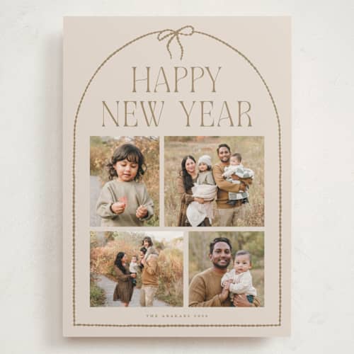 This is a buttercream holiday photo cards with standard by Vivian Yiwing called frame bow printing on recycled smooth signature in grand