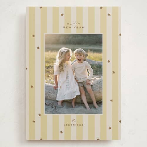 This is a butter holiday photo cards with standard by Ellen Schlegelmilch called stars & stripes printing on recycled smooth signature in grand