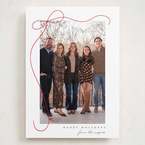 This is a snow holiday photo cards with standard by Lauren Chism called cascading bow printing on recycled smooth signature in grand