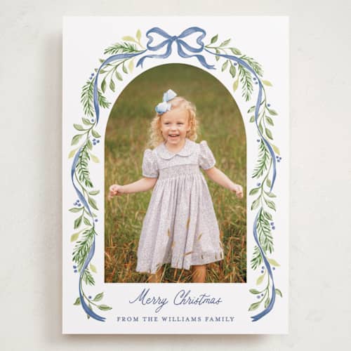 This is a moonlight holiday photo cards with standard by Sarah Knight called ribbon arch printing on recycled smooth signature in grand