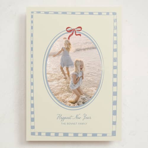 This is a celestial holiday photo cards with standard by Helena Vitto called little bow printing on recycled smooth signature in grand