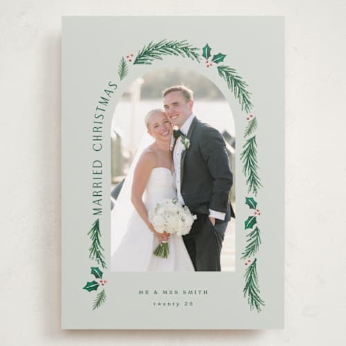 This is a sage holiday photo cards with standard by Hooray Creative called a married christmas printing on recycled smooth signature in grand