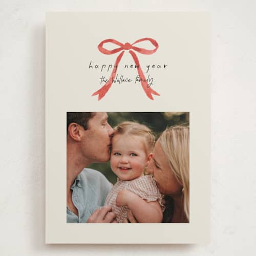 This is a peppermint holiday photo cards with standard by Laura Hankins called painted bow printing on recycled smooth signature in grand