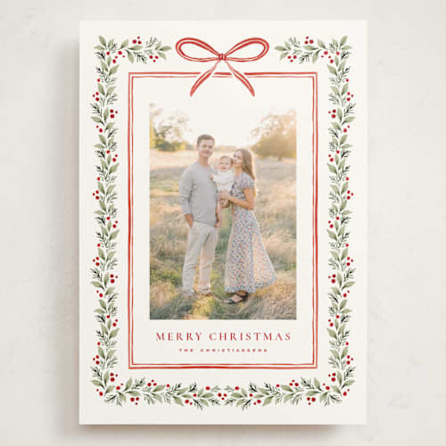This is a holly berry holiday photo cards with standard by Wildfield Paper Co called eucalyptus + holly printing on signature in grand