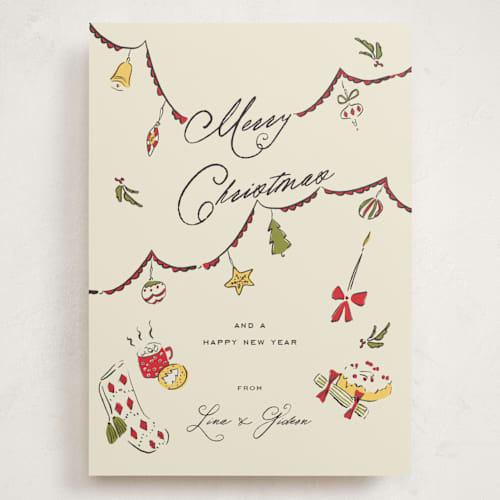 This is a holly berry holiday photo cards with standard by Sarah Rosenthal called garland cheer printing on signature in grand