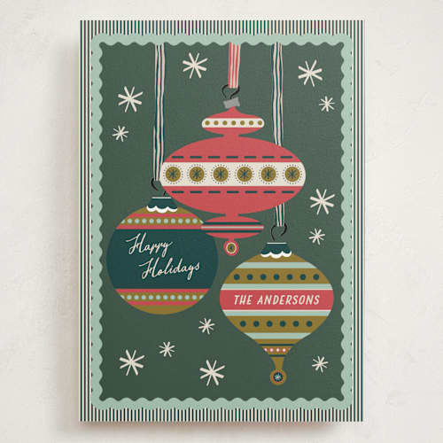 This is a pine holiday photo cards with standard by Heather Schertzer called mid-century ornaments printing on signature in grand