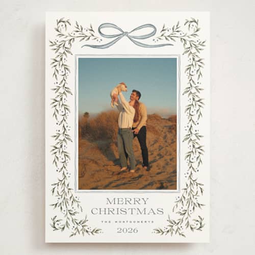 This is a juniper holiday photo cards with standard by Wildfield Paper Co called laurel wreath printing on signature in grand