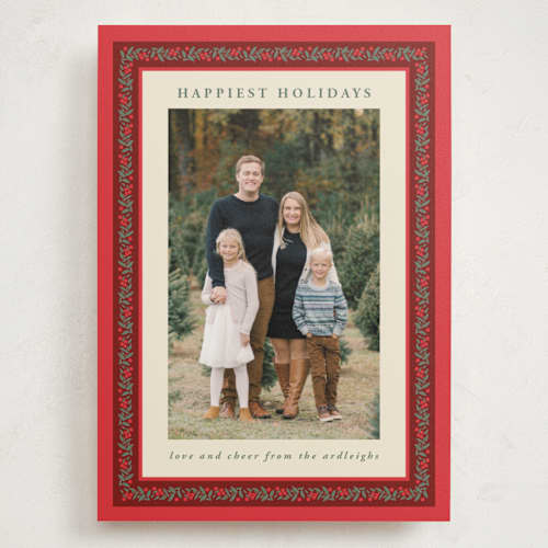 This is a holly berry holiday photo cards with standard by Kristie Kern called revelry printing on signature in grand