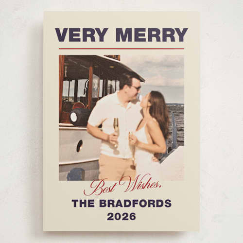 This is a navy holiday photo cards with standard by Ani Somi called masthead printing on signature in grand