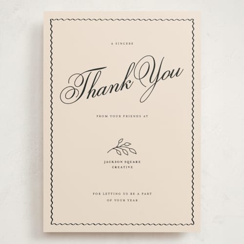This is a cream holiday photo cards with standard by Rachel Cassel called sincerely thank you printing on signature in grand