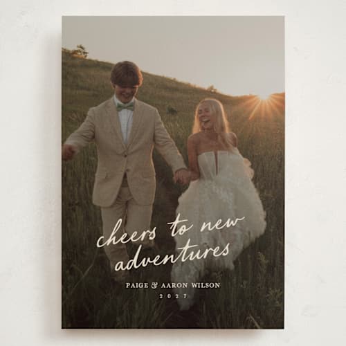 This is a creme holiday photo cards with standard by Owl and Toad called adventure printing on signature in grand