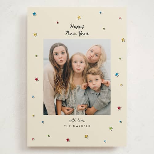 This is a champagne holiday photo cards with standard by Ilene Guy called bright star printing on signature in grand