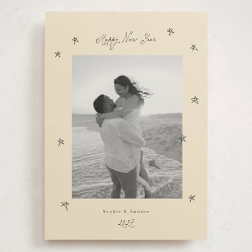 This is a vanilla holiday photo cards with standard by Benita Crandall called hand drawn stars printing on signature in grand