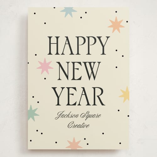 This is a cream holiday photo cards with standard by Robert and Stella called new year stars printing on signature in grand
