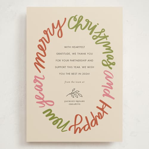 This is a jolly holiday photo cards with standard by Jen Owens called word wreath printing on signature in grand