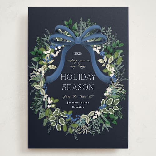 This is a blue spruce holiday photo cards with standard by Susan Moyal called holiday bow printing on signature in grand