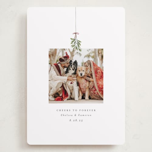 This is a winter holiday photo cards with standard by Randi Cirelli called married and merry printing on recycled smooth signature in grand