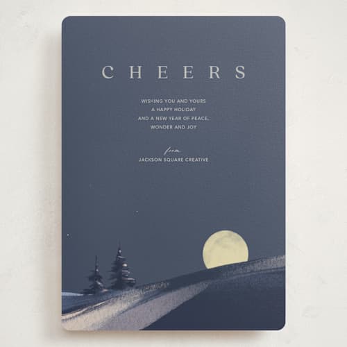 This is a navy holiday photo cards with standard by Eric Ransom called serene peace printing on signature in grand
