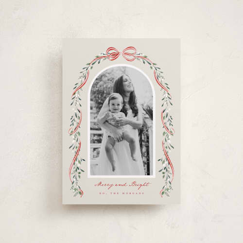 This is a peppermint petite holiday cards with standard by Leah Bisch called arch garland printing on recycled smooth signature in petite