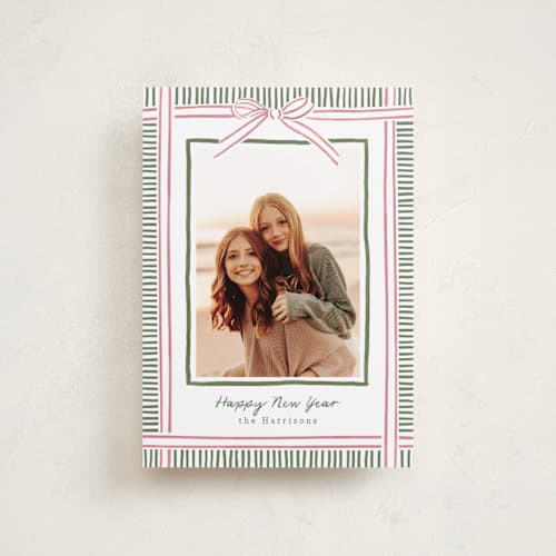 This is a pink sand petite holiday cards with standard by Chris Griffith called holiday wrap printing on recycled smooth signature in petite