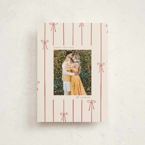 This is a cider petite holiday cards with standard by Ellen Schlegelmilch called lines of bows printing on recycled smooth signature in petite