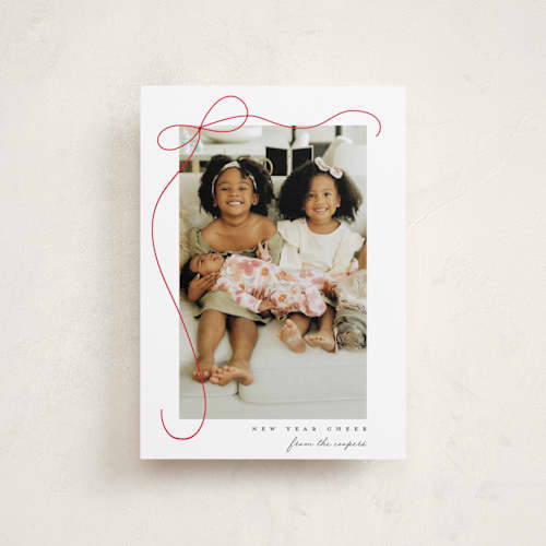 This is a snow petite holiday cards with standard by Lauren Chism called cascading bow printing on recycled smooth signature in petite