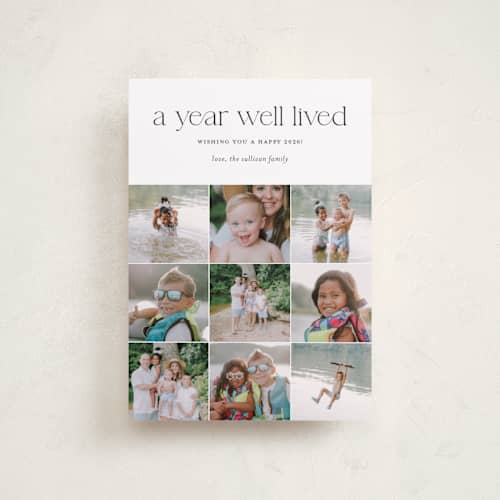 This is a midnight petite holiday cards with standard by Shari Margolin called annual review printing on recycled smooth signature in petite