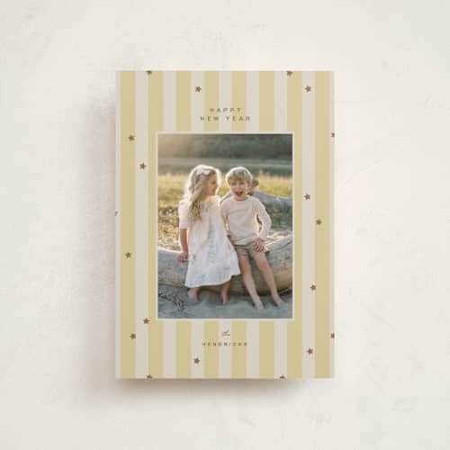 This is a butter petite holiday cards with standard by Ellen Schlegelmilch called stars & stripes printing on recycled smooth signature in petite