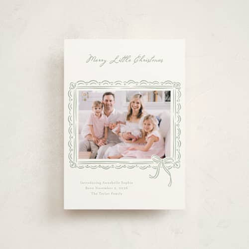 This is a evergreen babys first christmas with standard by Erin German called merry little christmas printing on signature in postcard