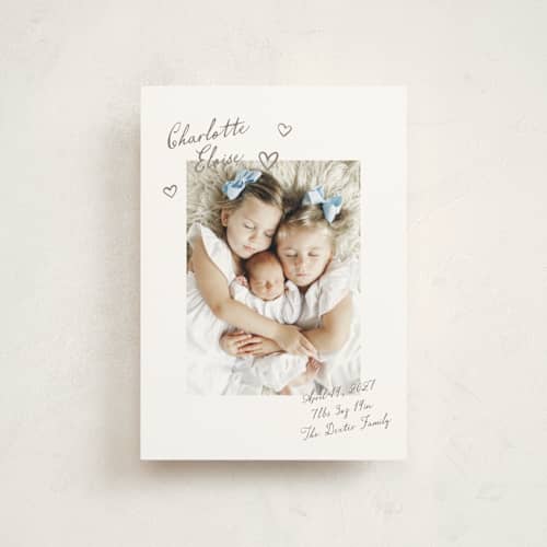 This is a sand birth announcement postcards with standard by Pixel and Hank called written printing on signature in postcard