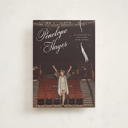 This is a snow graduation announcements with standard by Pixel and Hank called tassel type printing on signature in petite