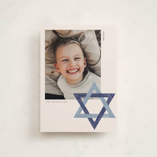 This is a blue spruce hanukkah cards with standard by Annie Montgomery called star of david printing on signature in postcard