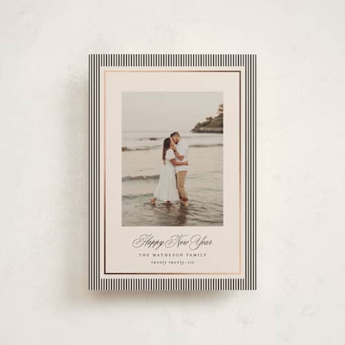 This is a linen petite holiday cards with foil pressed by Kelly Schmidt called striped elegance printing on signature in petite