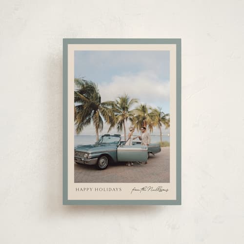 This is a pool petite holiday cards with standard by Chris Griffith called holiday band printing on signature in petite
