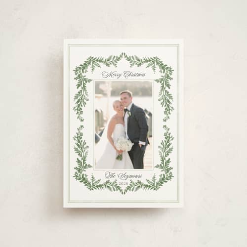 This is a pine petite holiday cards with standard by Susan Moyal called framed in holly printing on signature in petite