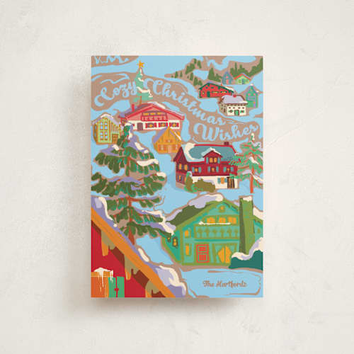 This is a glacier petite holiday cards with standard by Jess Franks called cozy winter village printing on signature in petite