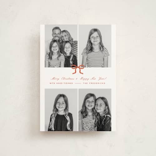 This is a poinsettia petite holiday cards with standard by Paper Raven Co. called merry memory printing on signature in petite