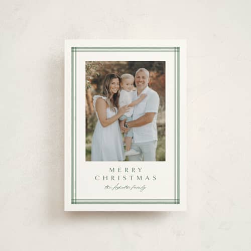 This is a pine christmas postcards with standard by Lea Delaveris called trim printing on signature in postcard