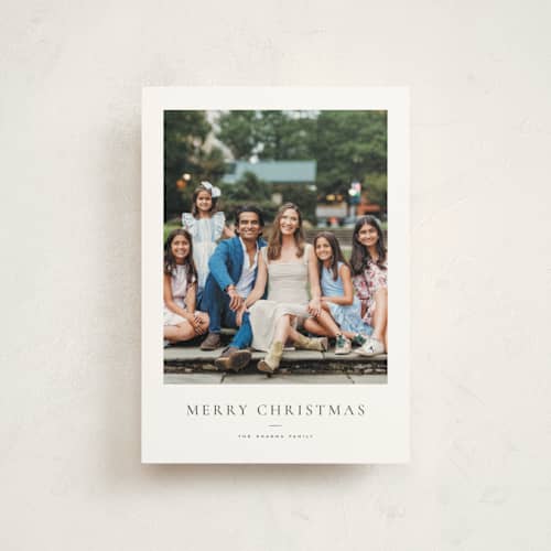 This is a pine christmas postcards with standard by Wildfield Paper Co called daisies printing on signature in postcard