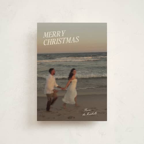 This is a cream christmas postcards with standard by Ani Somi called coastal holiday printing on signature in postcard