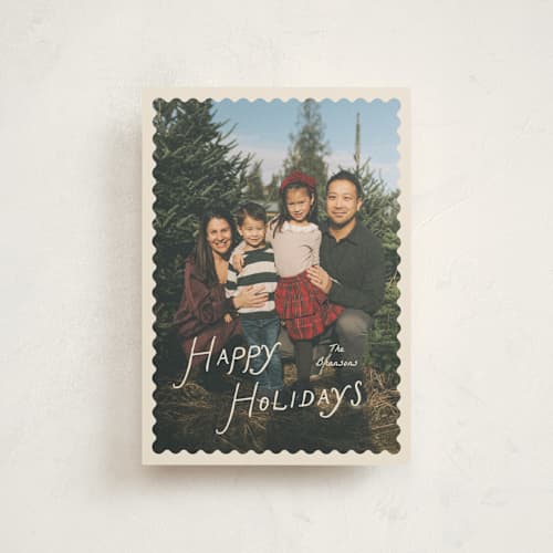 This is a cream christmas postcards with standard by Pixel and Hank called waved printing on signature in postcard