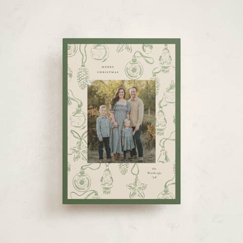 This is a pine christmas postcards with standard by Corinne Malesic called ornament collection printing on signature in postcard