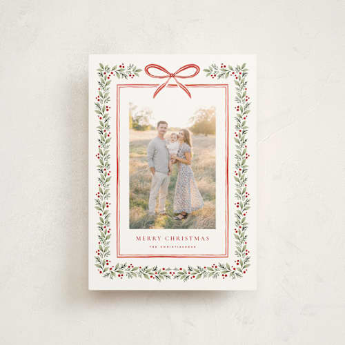 This is a holly berry christmas postcards with standard by Wildfield Paper Co called eucalyptus + holly printing on signature in postcard