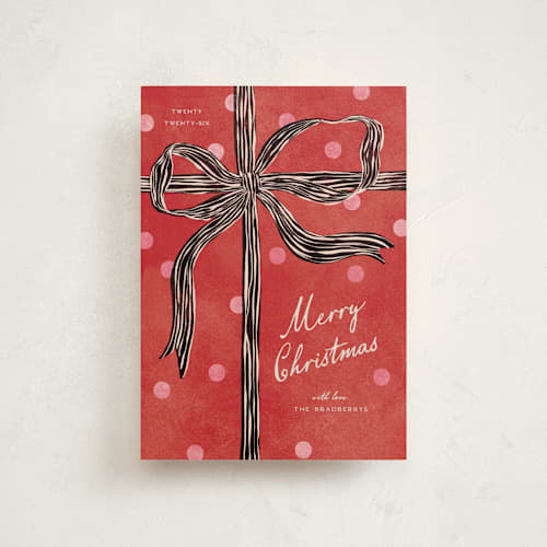 This is a holly christmas postcards with standard by Pixel and Hank called bow printing on signature in postcard