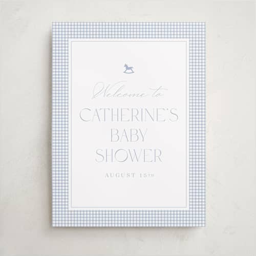 This is a baby blue baby shower decorations with standard by Olivia Raufman called gingham rockinghorse printing on premium sign board in 18x24